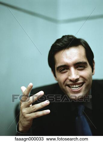 Businessman gesturing, portrait View Large Photo Image Stock Image - Businessman gesturing, portrait. Fotosearch