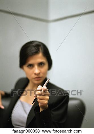 Businesswoman pointing at camera View Large Photo Image Stock Photo - Businesswoman pointing at camera. Fotosearch
