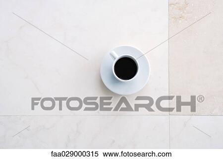 Coffee cup, high angle view View Large Photo Image Stock Photography - Coffee cup, high angle view. Fotosearch