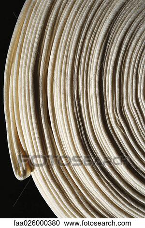 Coiled fabric, extreme close-up View Large Photo Image Stock Image - Coiled fabric, extreme close-up. Fotosearch