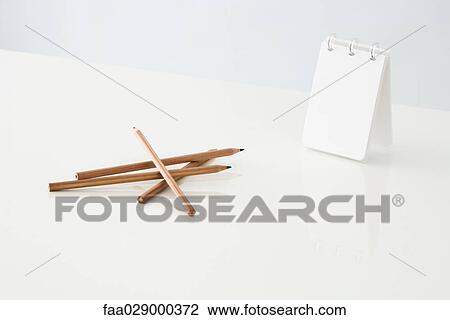 Colored pencils and blank notebook View Large Photo Image Stock Image - Colored pencils and blank notebook. Fotosearch