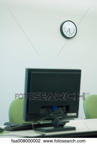 Computer monitor on table in office View Large Photo Image Stock Image - Computer monitor on table in office. Fotosearch