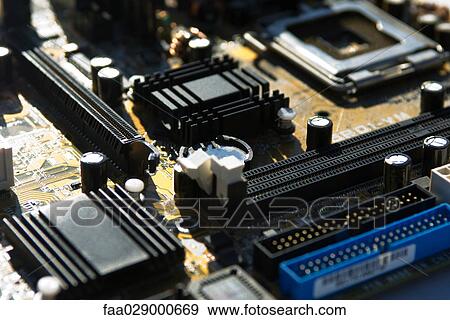 Computer motherboard, extreme close-up View Large Photo Image Stock Photo - Computer motherboard, extreme close-up. Fotosearch