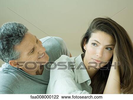 Couple, man looking at woman View Large Photo Image Stock Image - Couple, man looking at woman. Fotosearch