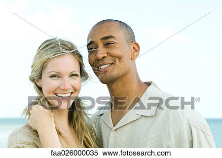 Couple smiling together, portrait View Large Photo Image Stock Photography - Couple smiling together, portrait. Fotosearch