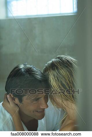 Couple with heads together View Large Photo Image Stock Photo - Couple with heads together. Fotosearch