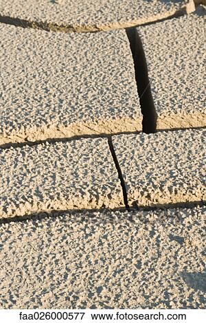 Cracked earth, extreme close-up View Large Photo Image Stock Photo - Cracked earth, extreme close-up. Fotosearch