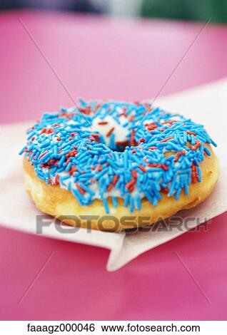 Donut with sprinkles View Large Photo Image Stock Photograph - Donut with sprinkles. Fotosearch