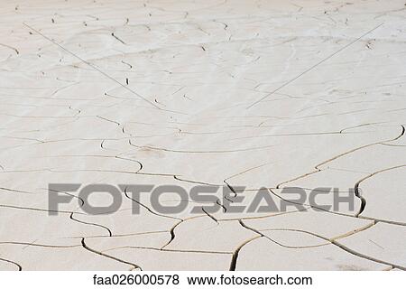 Dried mud with large cracks View Large Photo Image Stock Photo - Dried mud with large cracks. Fotosearch