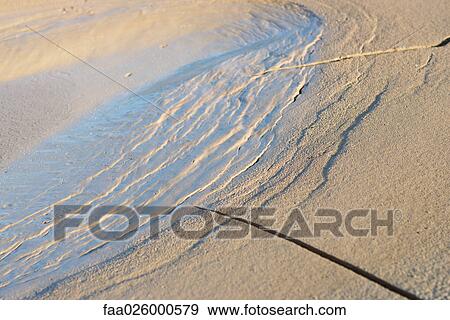 Drying mud with cracks, close-up View Large Photo Image Stock Photo - Drying mud with cracks, close-up. Fotosearch