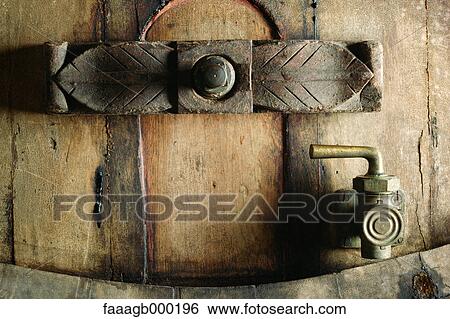 Stock Photograph - Faucet on wine barrel, close-up. Fotosearch