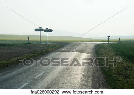 Forked road in countryside View Large Photo Image Stock Image - Forked road in countryside. Fotosearch