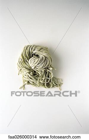 Fresh linguini pasta, high angle view View Large Photo Image Picture - Fresh linguini pasta, high angle view. Fotosearch