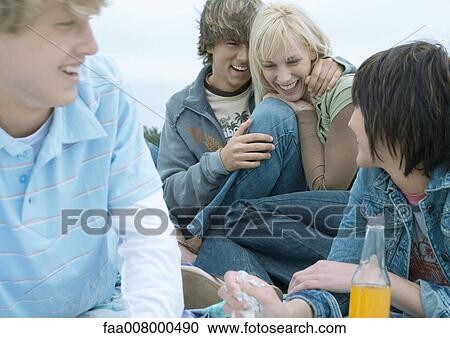 Friends hanging out together View Large Photo Image Stock Image - Friends hanging out together. Fotosearch