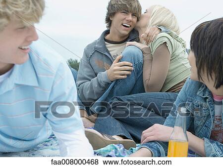Stock Photo - Friends hanging out together. Fotosearch