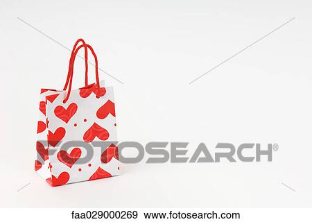 Gift bag with heart pattern View Large Photo Image Stock Photo - Gift bag with heart pattern. Fotosearch