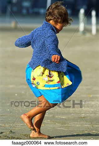 Girl on beach View Large Photo Image Picture - Girl on beach. Fotosearch