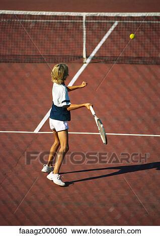 Girl playing tennis View Large Photo Image Stock Image - Girl playing tennis. Fotosearch