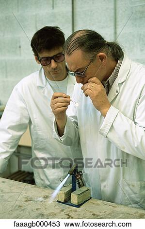 Glass blower forming neon tube View Large Photo Image Stock Image - Glass blower forming neon tube. Fotosearch