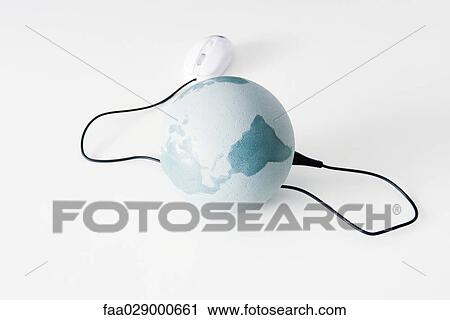 Globe connected to computer mouse, close-up View Large Photo Image Stock Image - Globe connected to computer mouse, close-up. Fotosearch