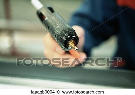 Stock Image - Glue gun. Fotosearch