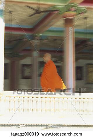 India, Ahmedabad, monk in buddhist temple View Large Photo Image Stock Photo - India, Ahmedabad, monk in buddhist temple. Fotosearch
