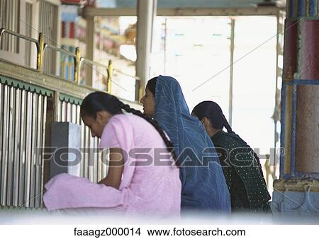 India, Ahmedabad, women in temple View Large Photo Image Picture - India, Ahmedabad, women in temple. Fotosearch