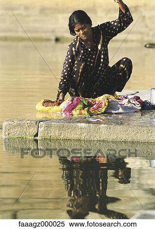 India, Sarkej, woman washing clothes by river View Large Photo Image Stock Photography - India, Sarkej, woman washing clothes by river. Fotosearch