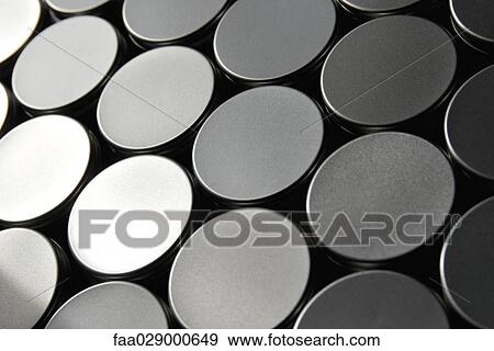 Stock Photo - Jar lids arranged in pattern, close-up, full frame. Fotosearch