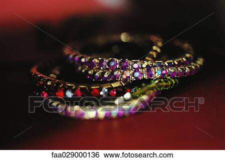Jeweled bracelets, close-up View Large Photo Image Stock Photograph - Jeweled bracelets, close-up. Fotosearch