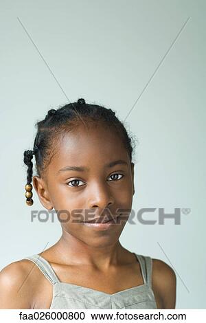 Little girl, smiling at camera, head and shoulders, portrait View Large Photo Image Stock Image - Little girl, smiling at camera, head and shoulders, portrait. Fotosearch