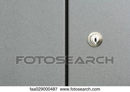 Lock on cabinet door, full frame View Large Photo Image Stock Photo - Lock on cabinet door, full frame. Fotosearch