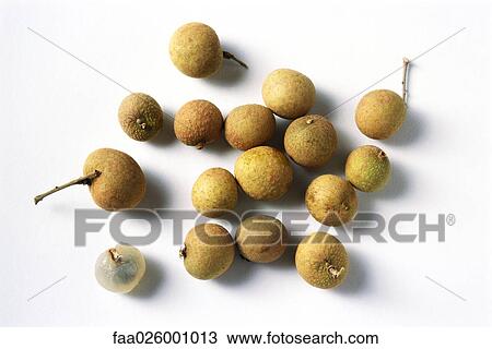 Longans, one peeled, close-up View Large Photo Image Stock Image - Longans, one peeled, close-up. Fotosearch