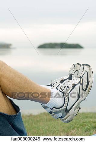Man exercising, close-up of feet and calves View Large Photo Image Stock Photograph - Man exercising, close-up of feet and calves. Fotosearch