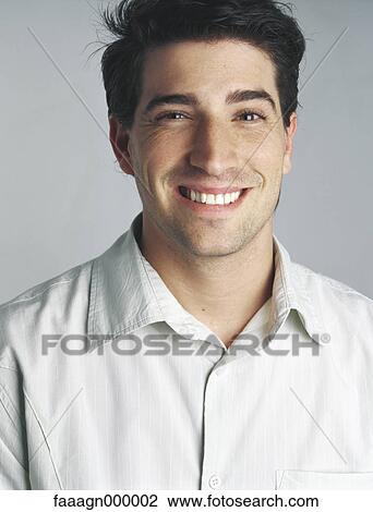 Man smiling, portrait View Large Photo Image Stock Image - Man smiling, portrait. Fotosearch