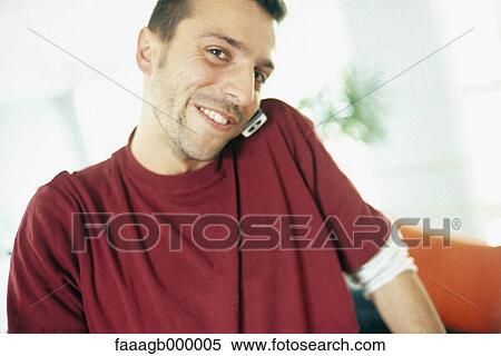 Man using cell phone View Large Photo Image Stock Photography - Man using cell phone. Fotosearch