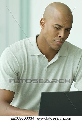 Man using computer View Large Photo Image Picture - Man using computer. Fotosearch