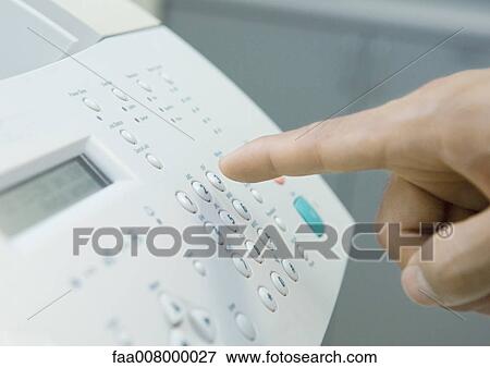 Man's finger about to push button on fax machine View Large Photo Image Stock Photo - Man's finger about to push button on fax machine. Fotosearch