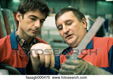 Manual and apprentice View Large Photo Image Stock Image - Manual and apprentice. Fotosearch