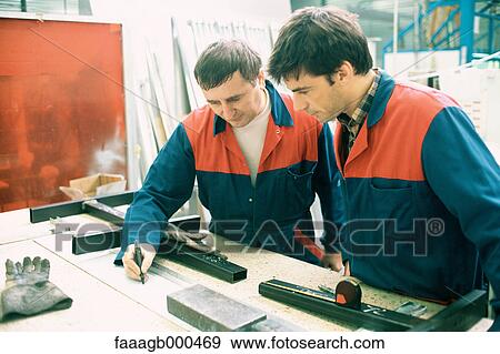 Manual worker and apprentice View Large Photo Image Stock Photo - Manual worker and apprentice. Fotosearch
