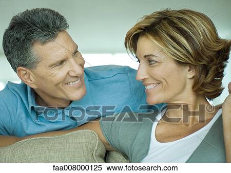 Mature couple smiling at each other View Large Photo Image Stock Photography - Mature couple smiling at each other. Fotosearch