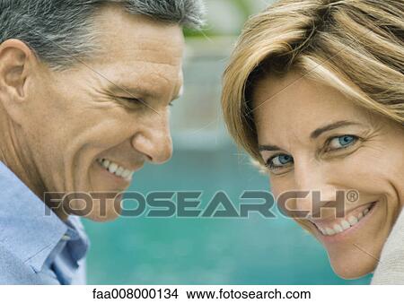 Mature couple, woman looking at camera View Large Photo Image Picture - Mature couple, woman looking at camera. Fotosearch