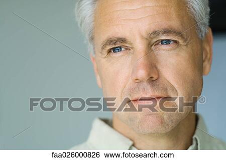 Mature man, looking out of frame, close-up, portrait View Large Photo Image Stock Photograph - Mature man, looking out of frame, close-up, portrait. Fotosearch