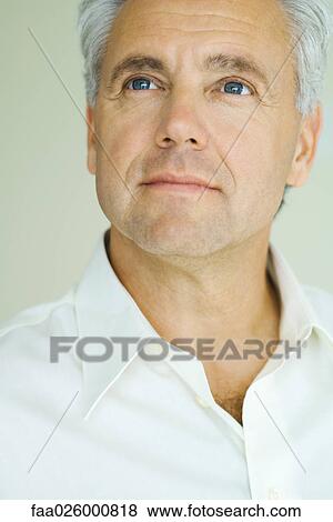 Mature man looking up, close-up, portrait View Large Photo Image Stock Photo - Mature man looking up, close-up, portrait. Fotosearch