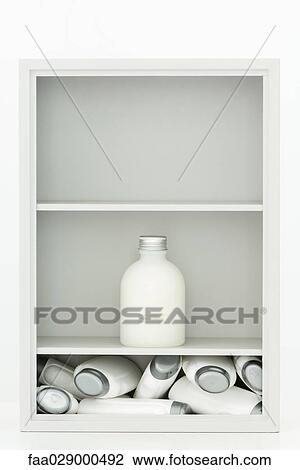 Medicine cabinet, containing too many bottles on one shelf, single jar on higher shelf View Large Photo Image Stock Image - Medicine cabinet, containing too many bottles on one shelf, single jar on higher shelf. Fotosearch
