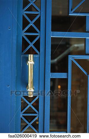 Metal and glass door with handle, close-up View Large Photo Image Stock Photo - Metal and glass door with handle, close-up. Fotosearch