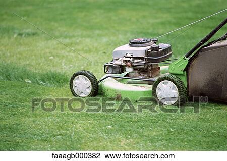 Mowing grass View Large Photo Image Stock Image - Mowing grass. Fotosearch