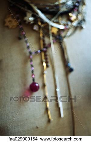 Necklaces, close-up, defocused View Large Photo Image Picture - Necklaces, close-up, defocused. Fotosearch