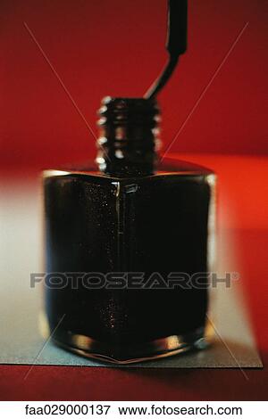 Open nail polish bottle, close-up View Large Photo Image Stock Photo - Open nail polish bottle, close-up. Fotosearch