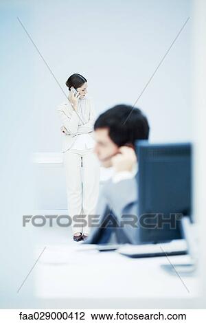 People working in office View Large Photo Image Stock Image - People working in office. Fotosearch